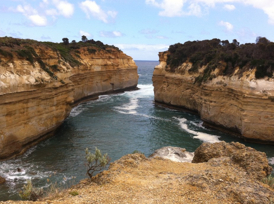 high rock faced tiny inlets were survivors drifted ashore as no one could really swim